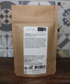 Sac en papier kraft d'épices bio pour houmous avec étiquette détaillant la composition et les conseils d'utilisation.
