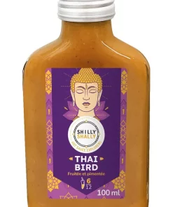 Bouteille de sauce piquante Shilly Shally Thai Bird, 100ml, au goût fruité et pimenté, étiquette violette avec motif exotique.