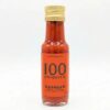 Bouteille de sauce piquante 100 Piments d'Inferno Peppers, étiquette orange et bouchon doré.
