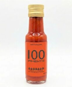 Bouteille de sauce piquante 100 Piments d'Inferno Peppers, étiquette orange et bouchon doré.